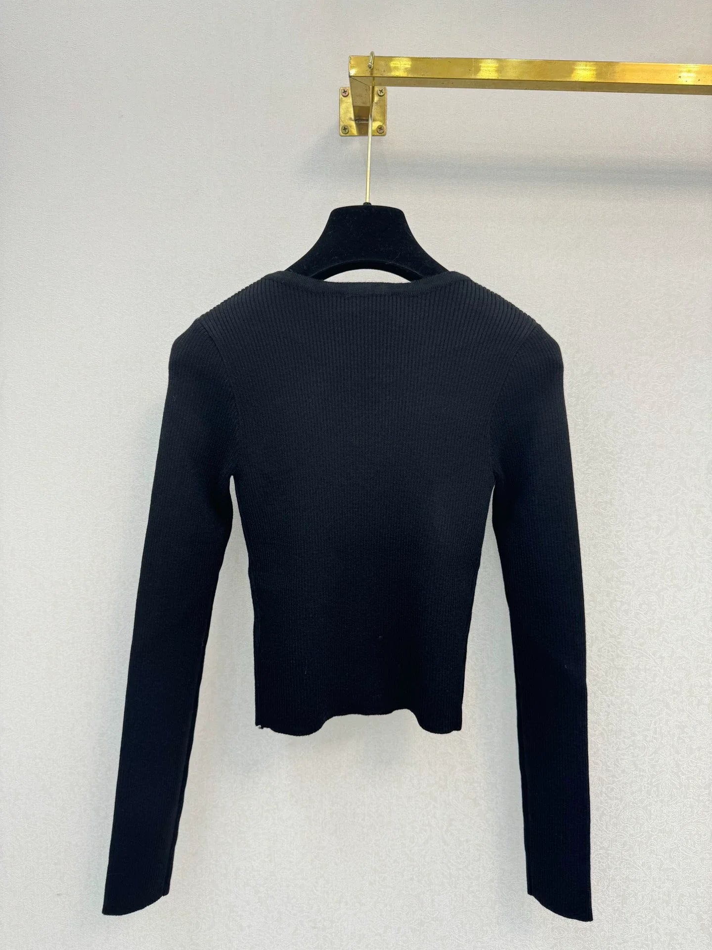 Black knitted long sleeved top