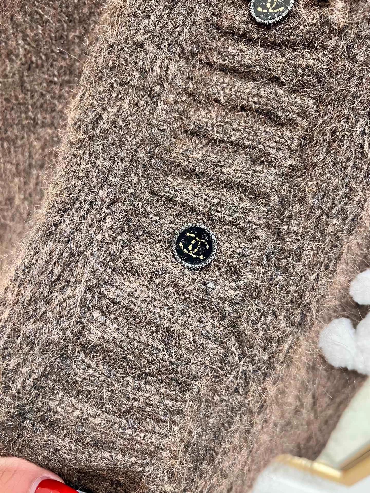 Raccoon fleece blend knit cardigan