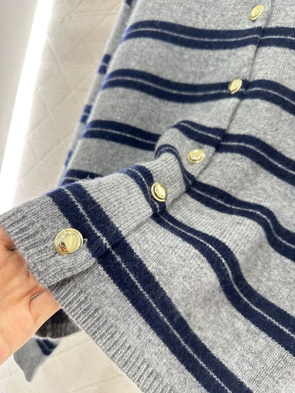 25 Striped knitted long sleeved cardigan