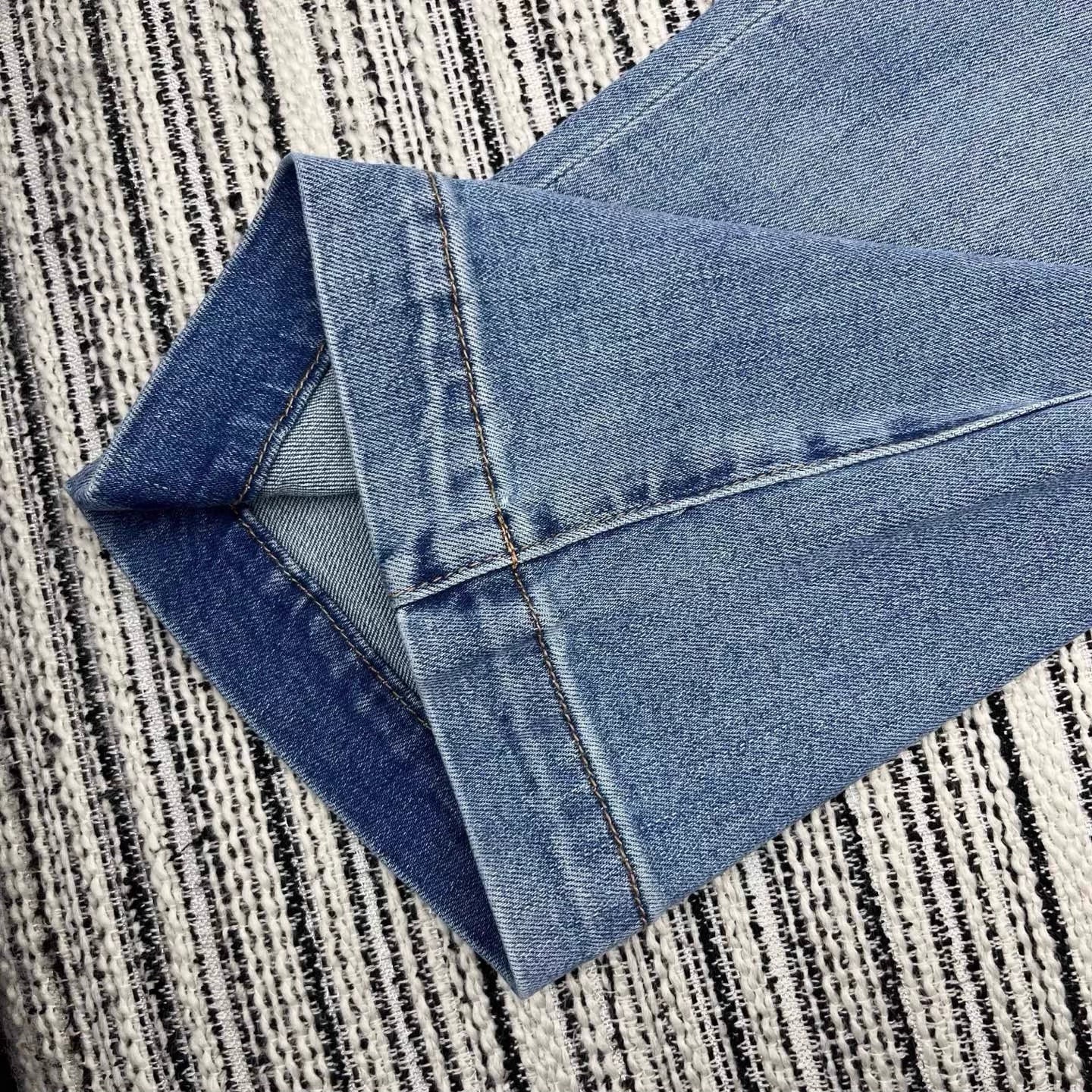 Rhinestone-studded flared jeans