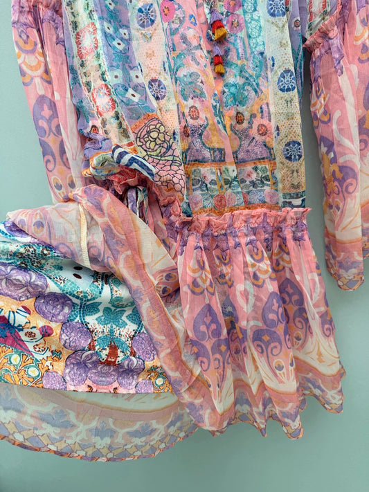 26Bohemian-Style Printed Mini Dress with Tassel Accents