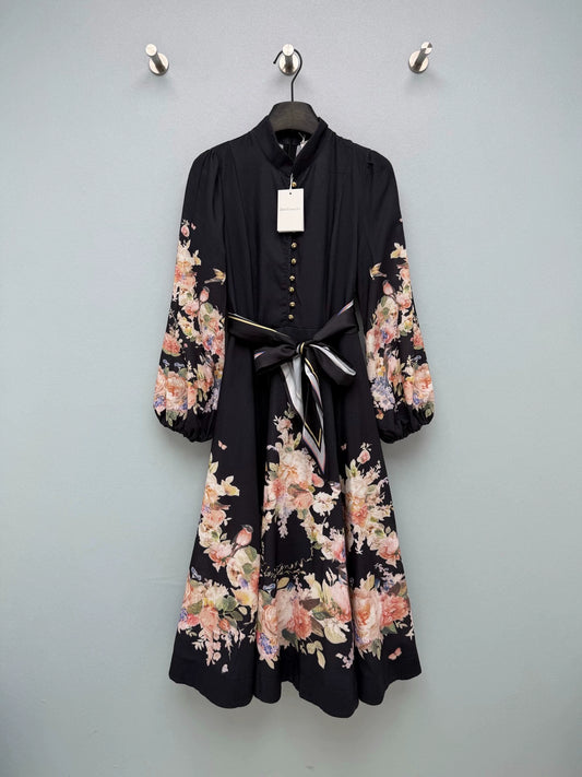 26Dress with a Black-Based Floral and Bird Print and a Matching Ribbon Sash