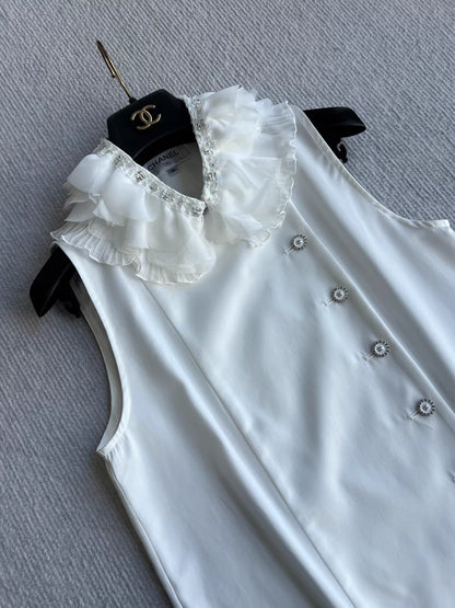 Sleeveless side-button petal blouse