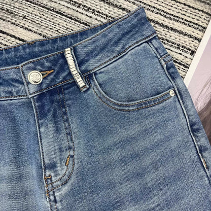 Rhinestone-studded flared jeans