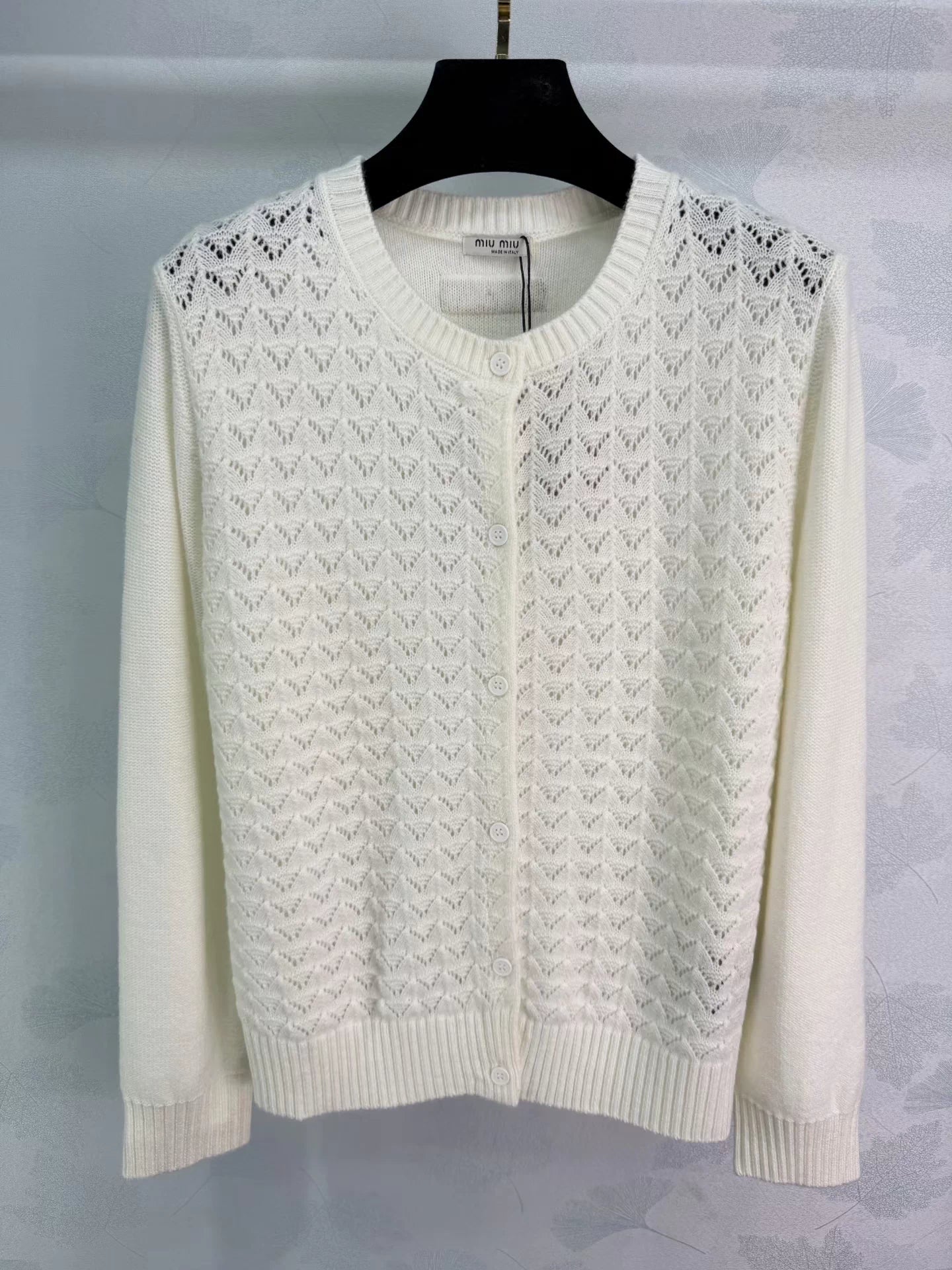 Feather-patterned openwork knit cardigan