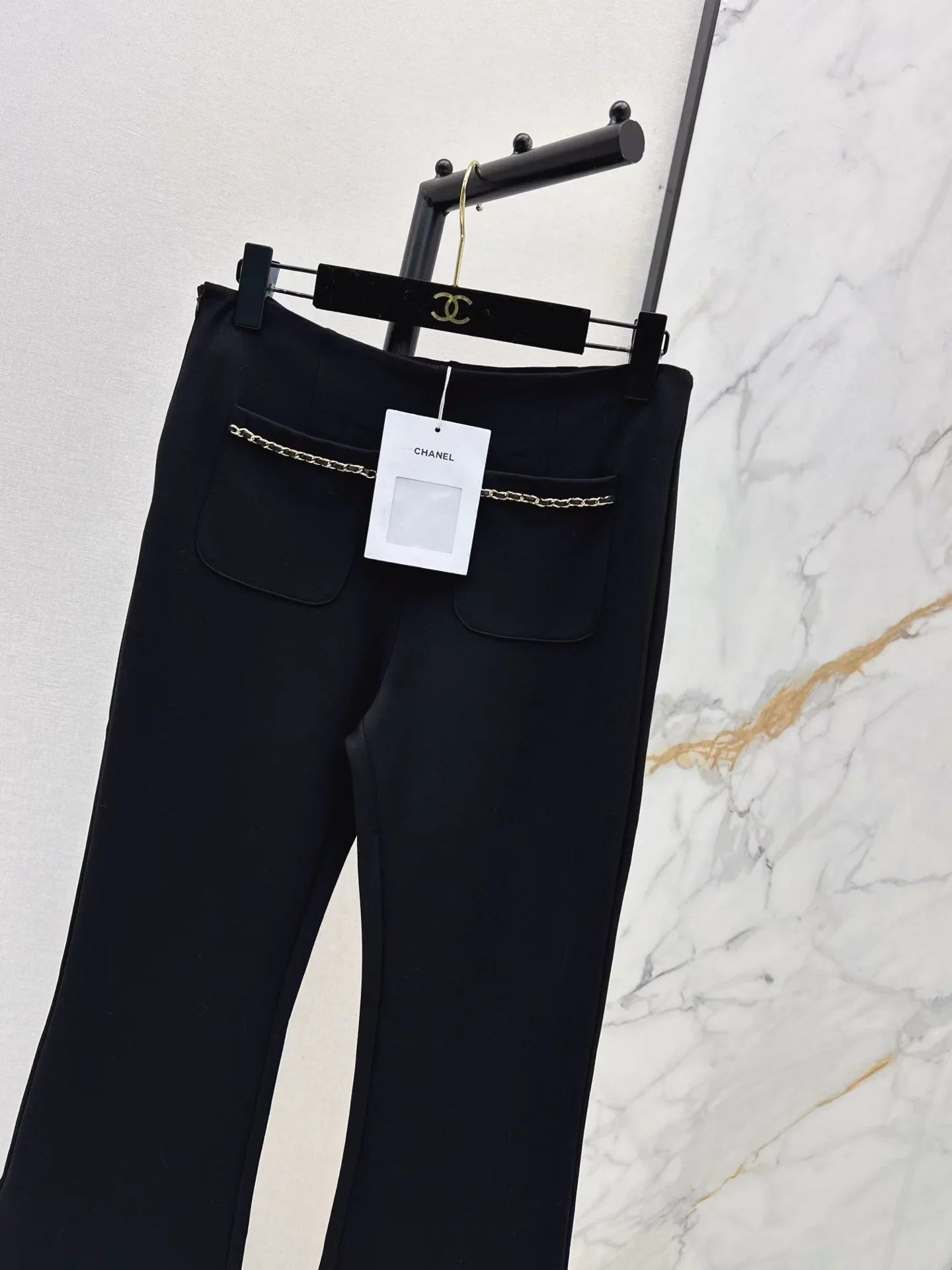 Chain pocket flared trousers