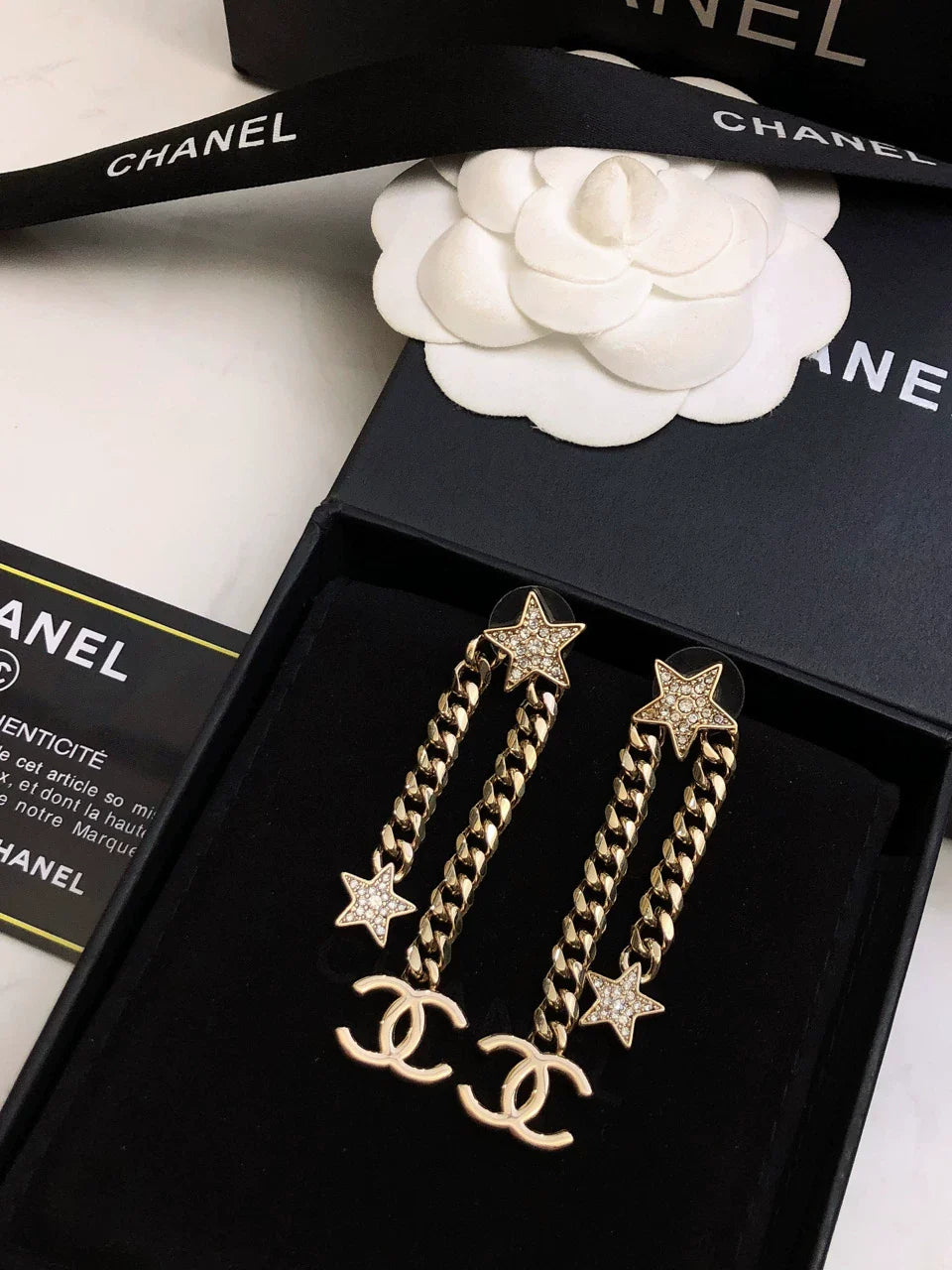 Star chain tassel earrings