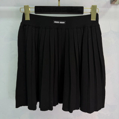 leeveless vest + pleated skirt set