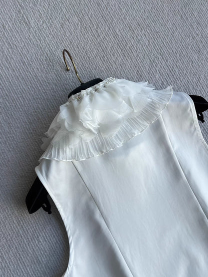 Sleeveless side-button petal blouse