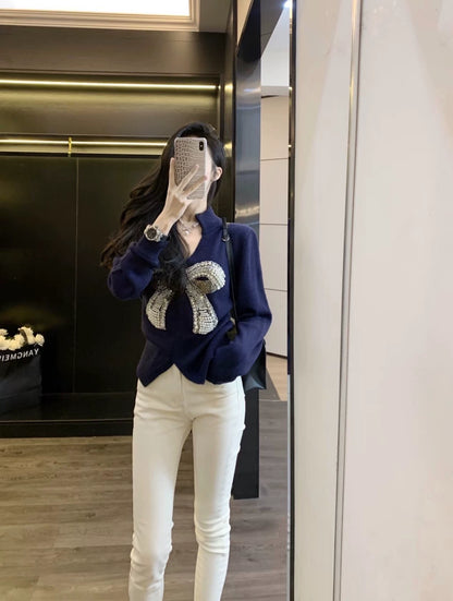 Pearl-studded bow pullover