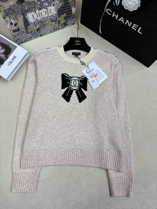 Color-blocked logo bow jacquard top