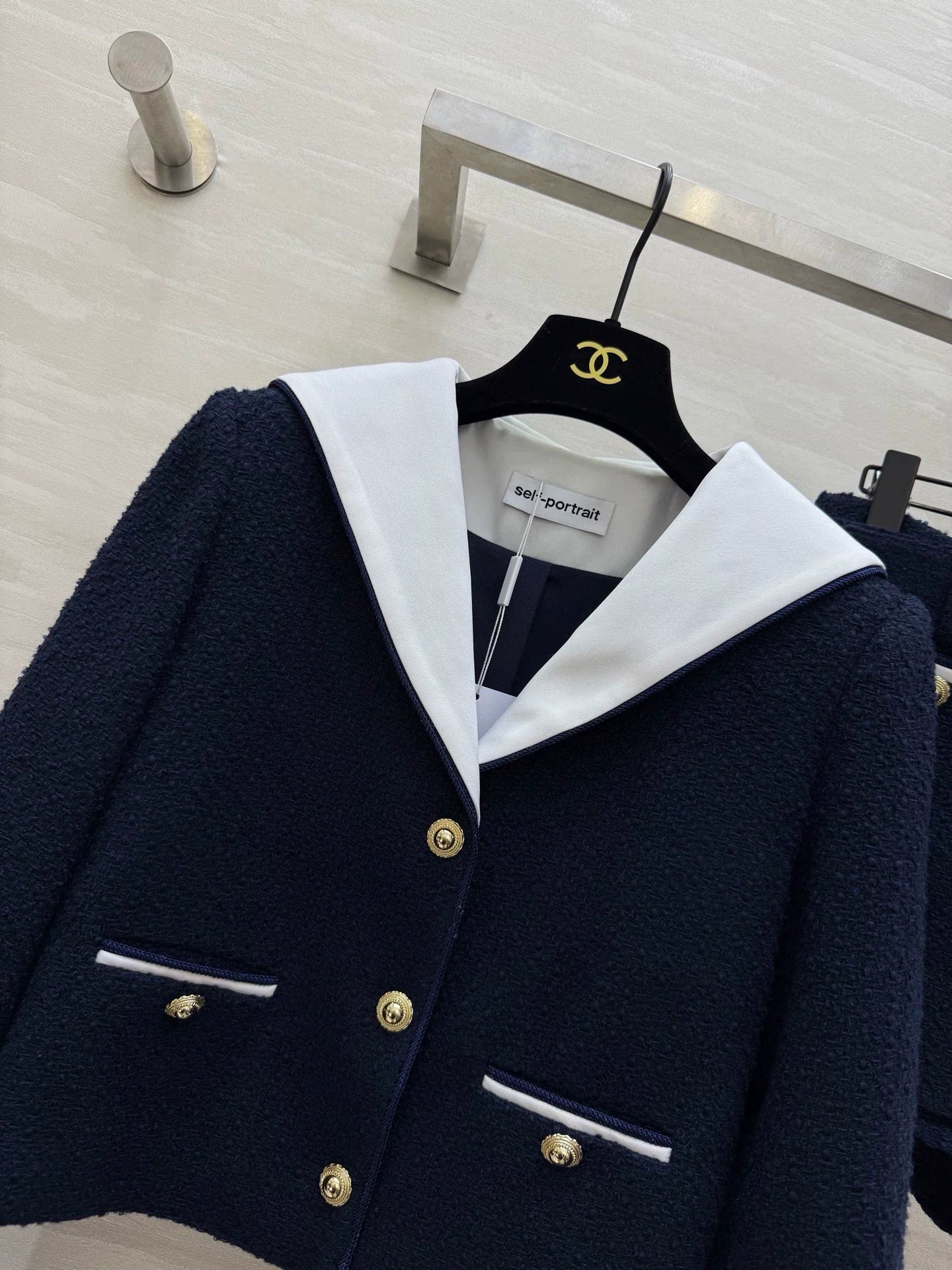 Navy collar tweed suit