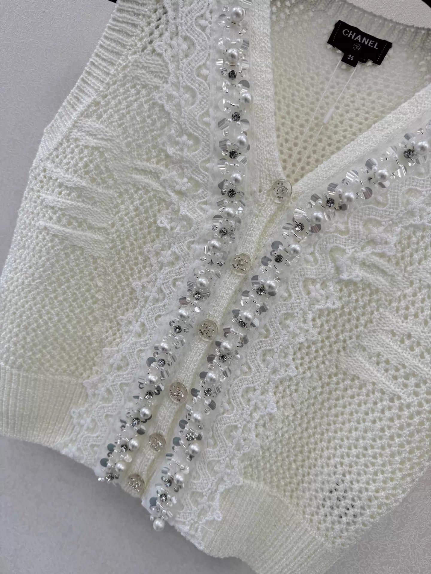 26ss Lace-trimmed openwork knit vest