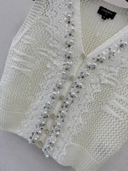 26ss Lace-trimmed openwork knit vest