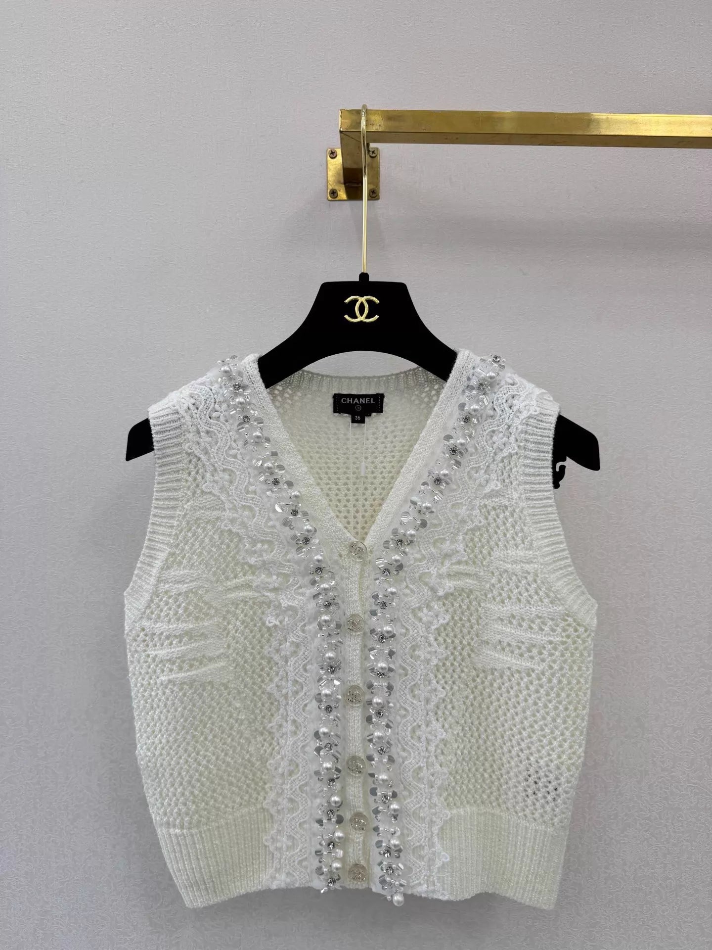 26ss Lace-trimmed openwork knit vest