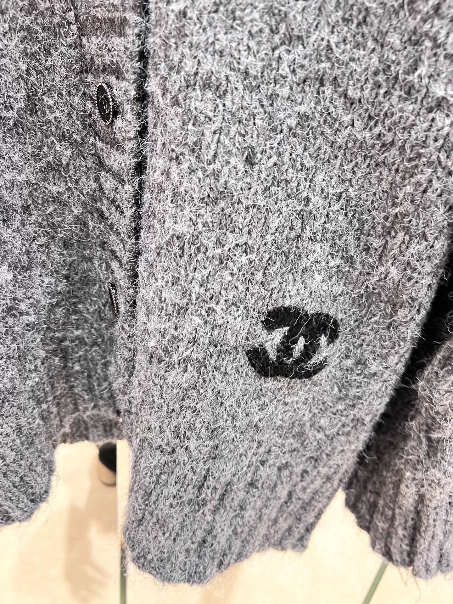 Raccoon fleece blend knit cardigan