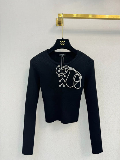 Black knitted long sleeved top