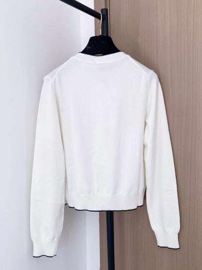 Heart-patterned knitted cardigan