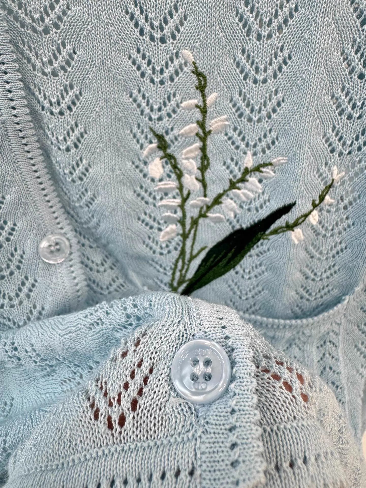 Light blue knitted cardigan