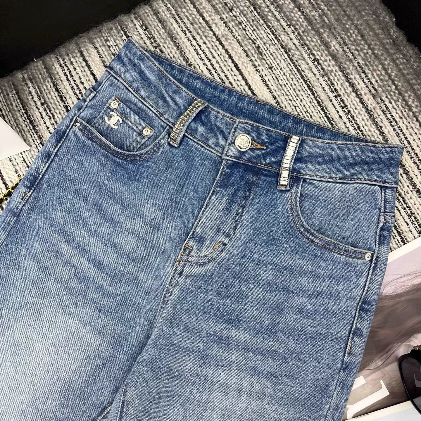 Rhinestone-studded flared jeans