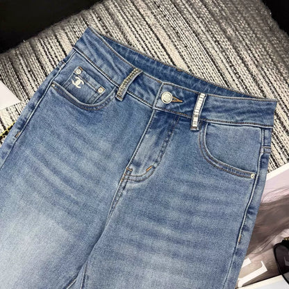 Rhinestone-studded flared jeans