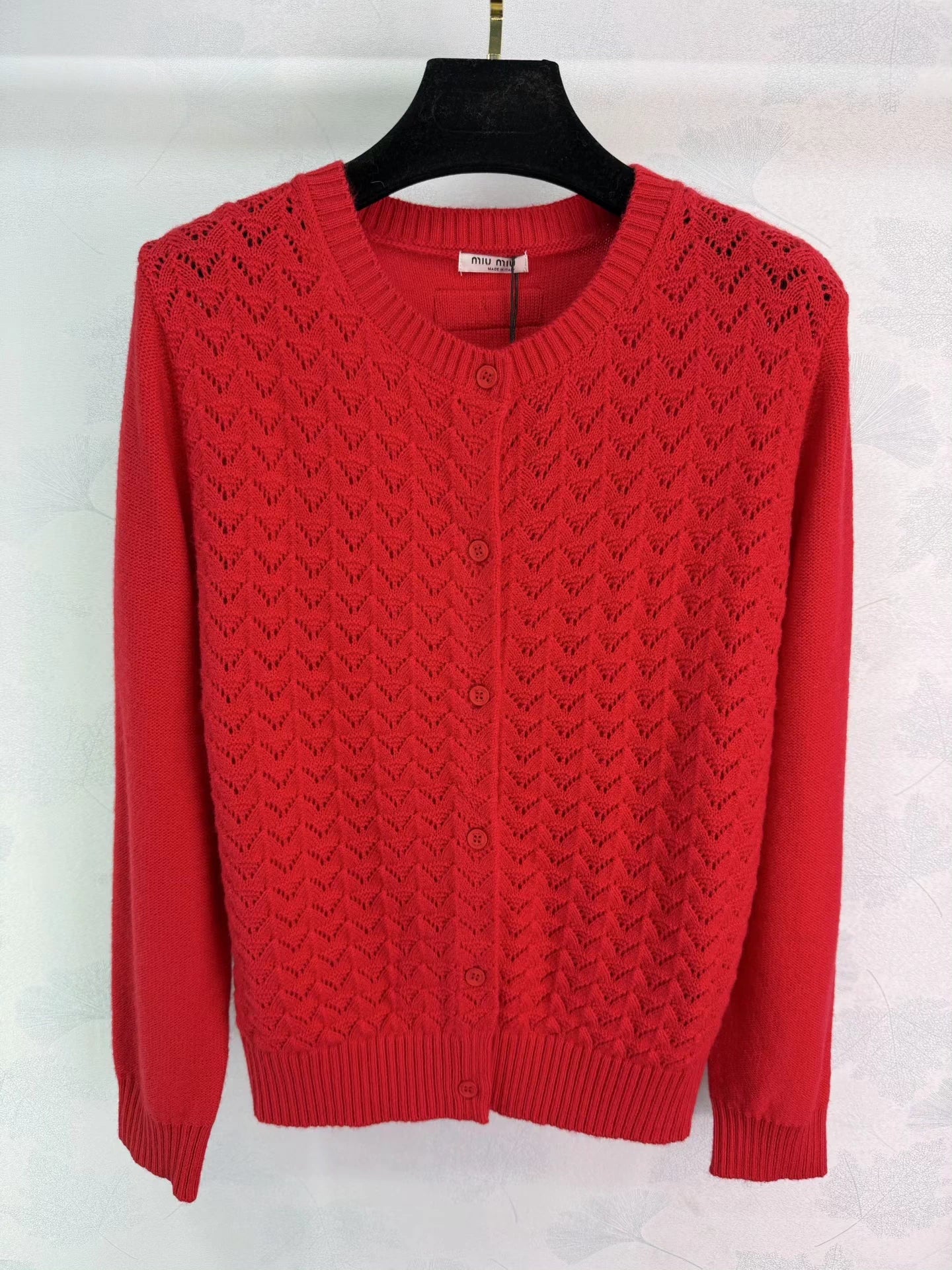Feather-patterned openwork knit cardigan
