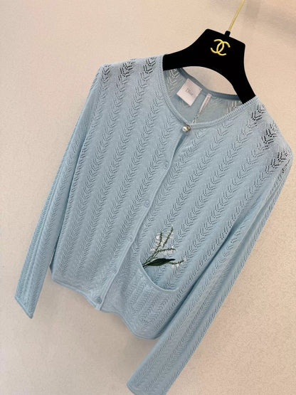Light blue knitted cardigan