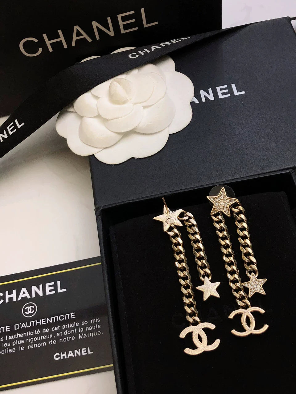 Star chain tassel earrings