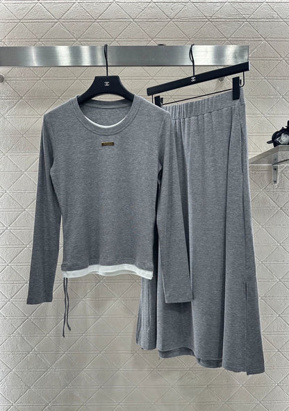 25 Fake two round neck long sleeved+half skirt set
