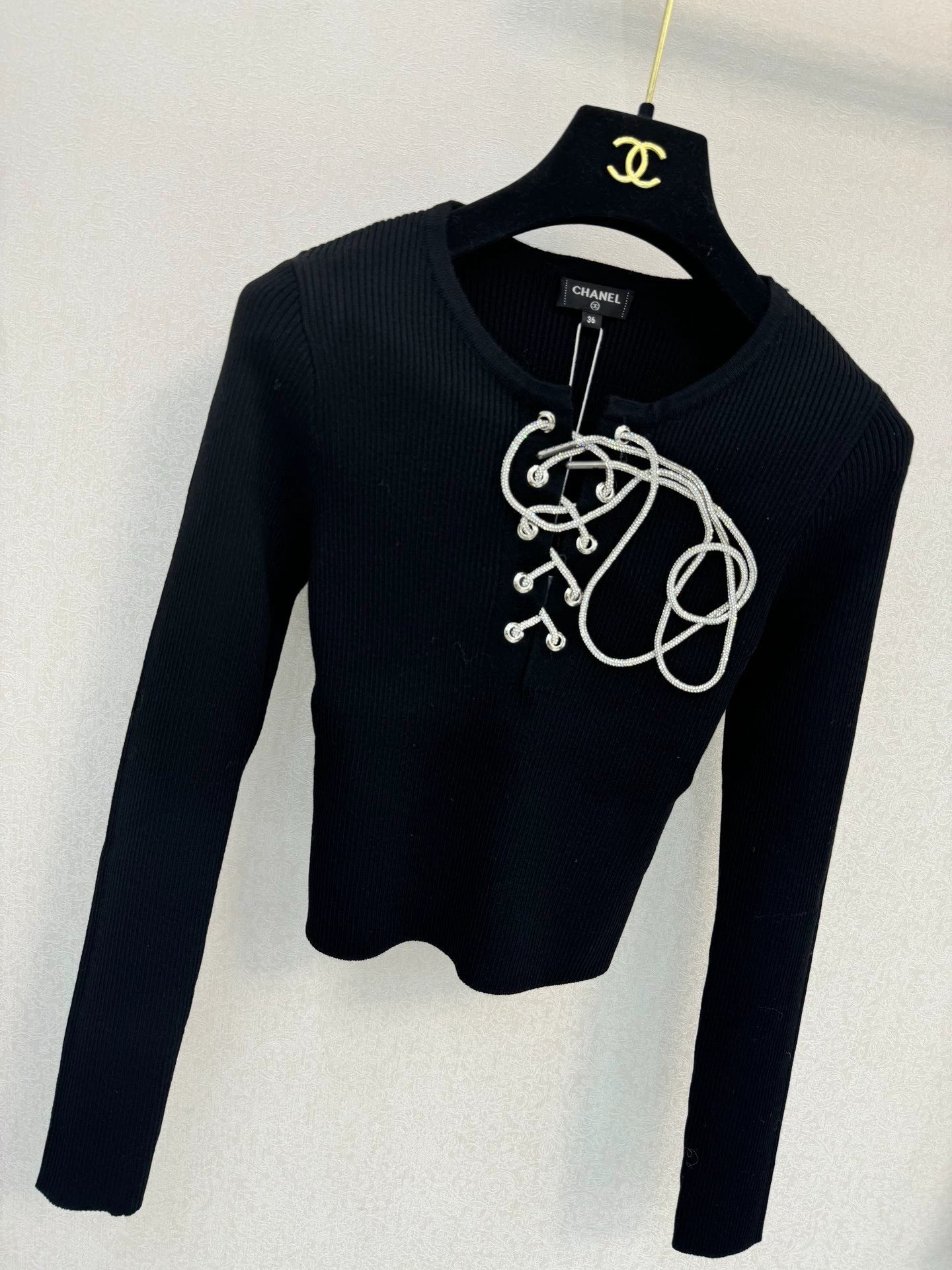 Black knitted long sleeved top