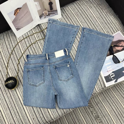 Rhinestone-studded flared jeans