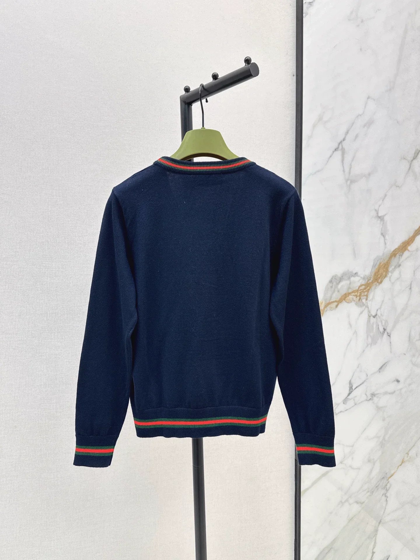 25 Knitted cardigan with woven pattern and V-neck