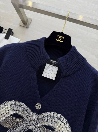 Pearl-studded bow pullover