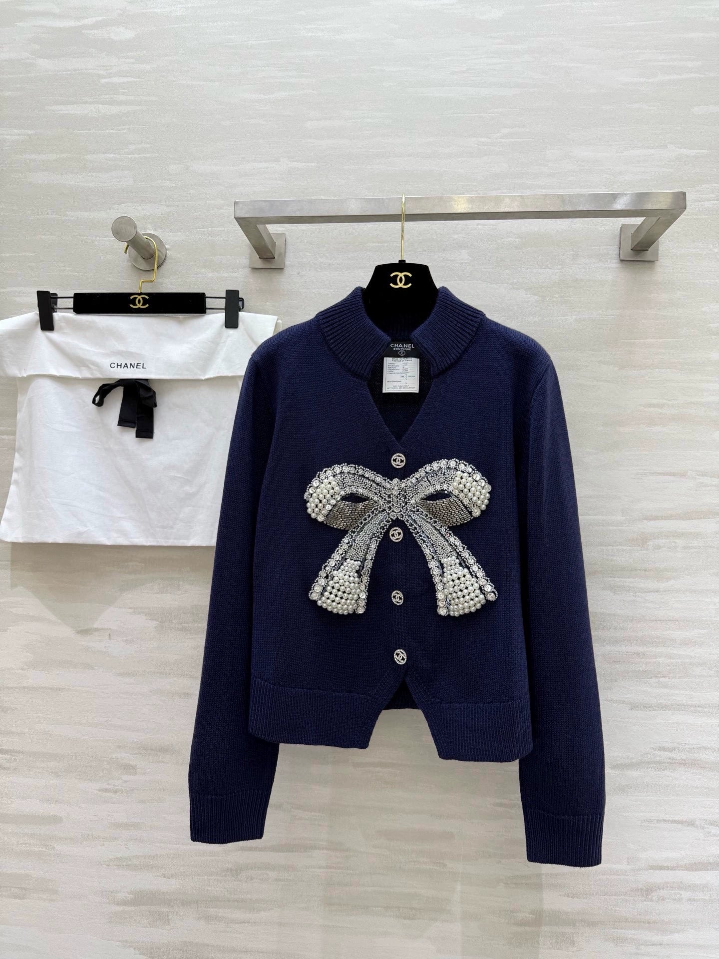 Pearl-studded bow pullover