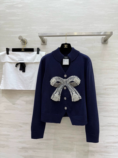 Pearl-studded bow pullover