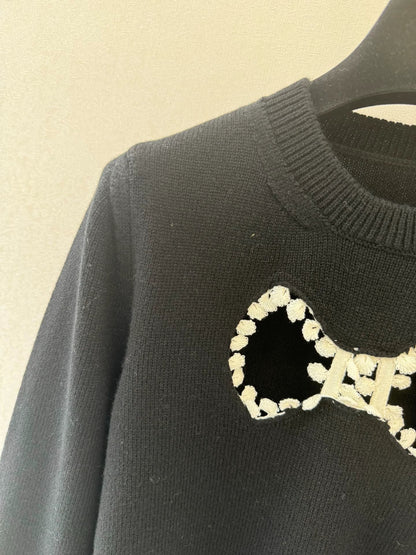 Bow hollow knitted sweater