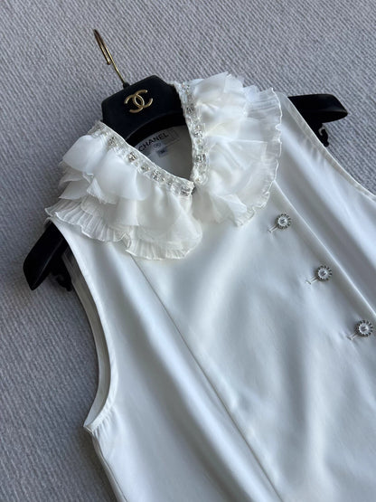 Sleeveless side-button petal blouse