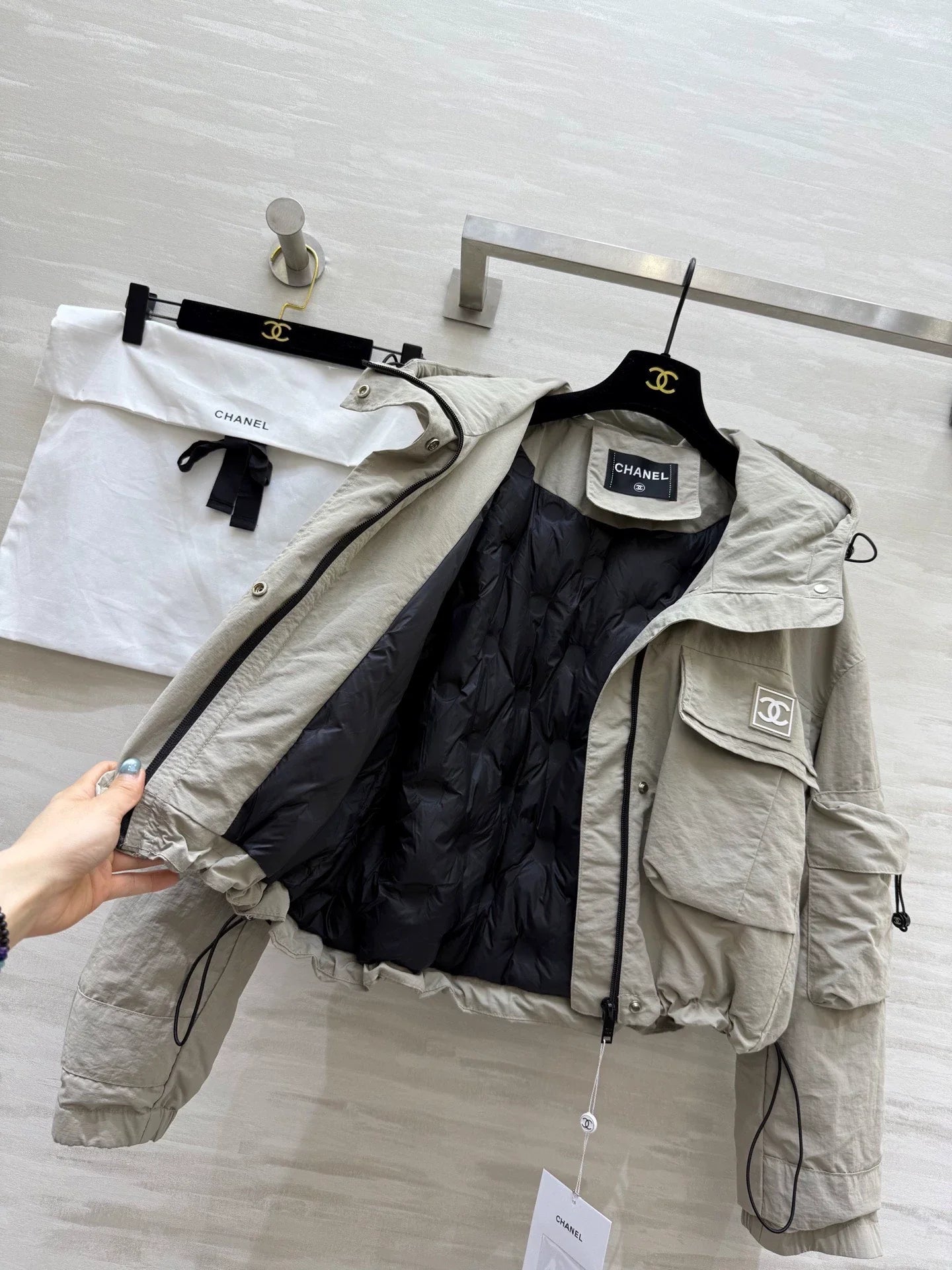 Hooded drawstring down jacket