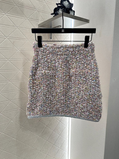 25 Knitted tweed cardigan and skirt set