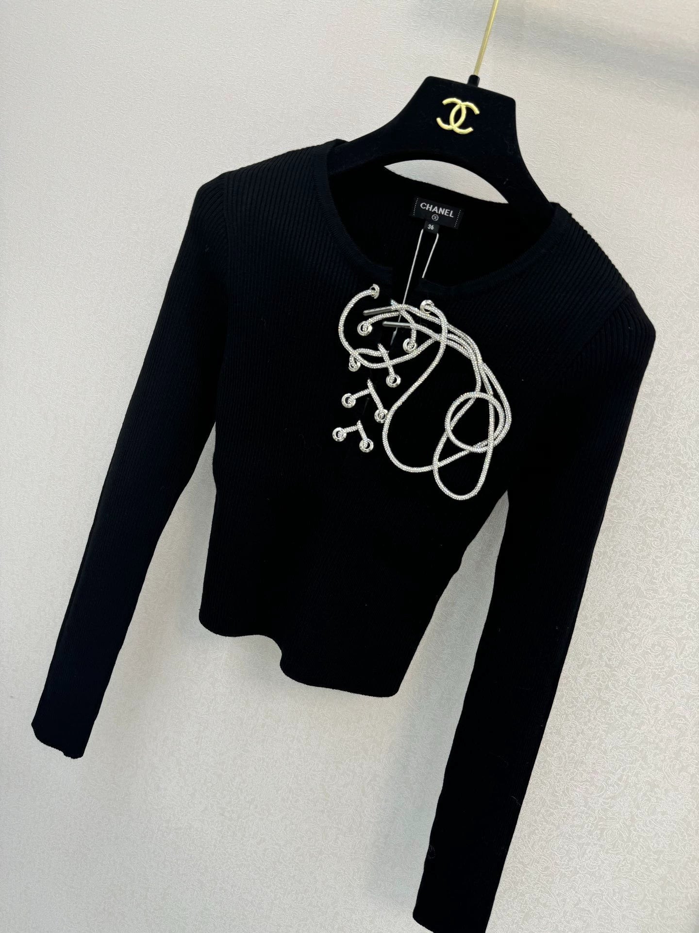 Black knitted long sleeved top