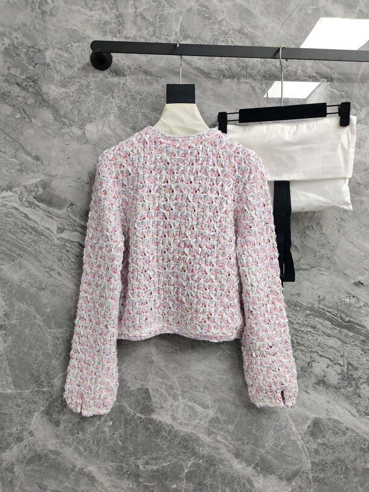 26Pink-and-white tweed, openwork, cropped, Chanel-style round-neck jacket