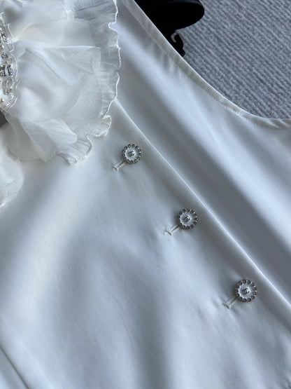 Sleeveless side-button petal blouse