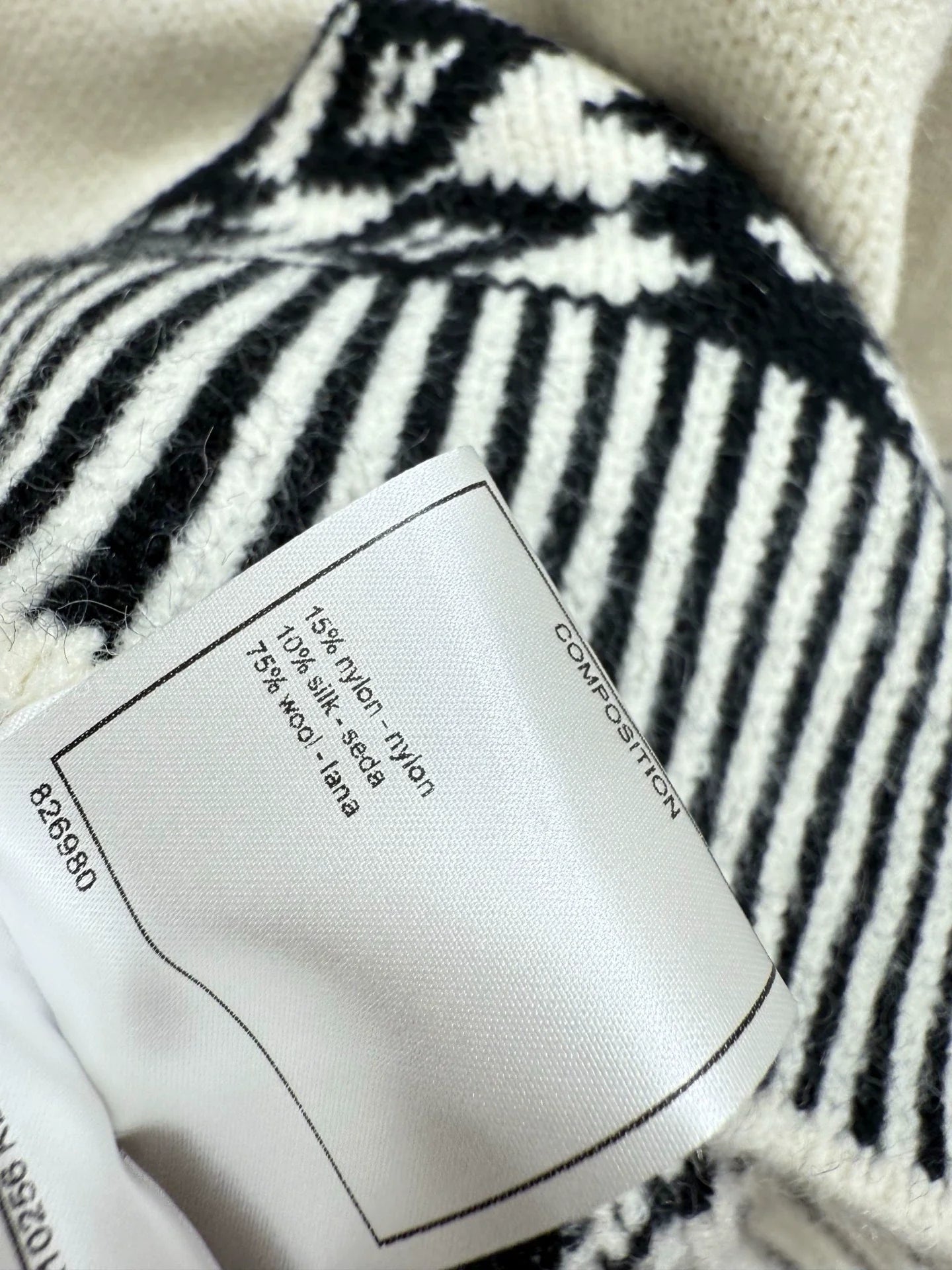 Black and white contrasting diamond patterned sweater