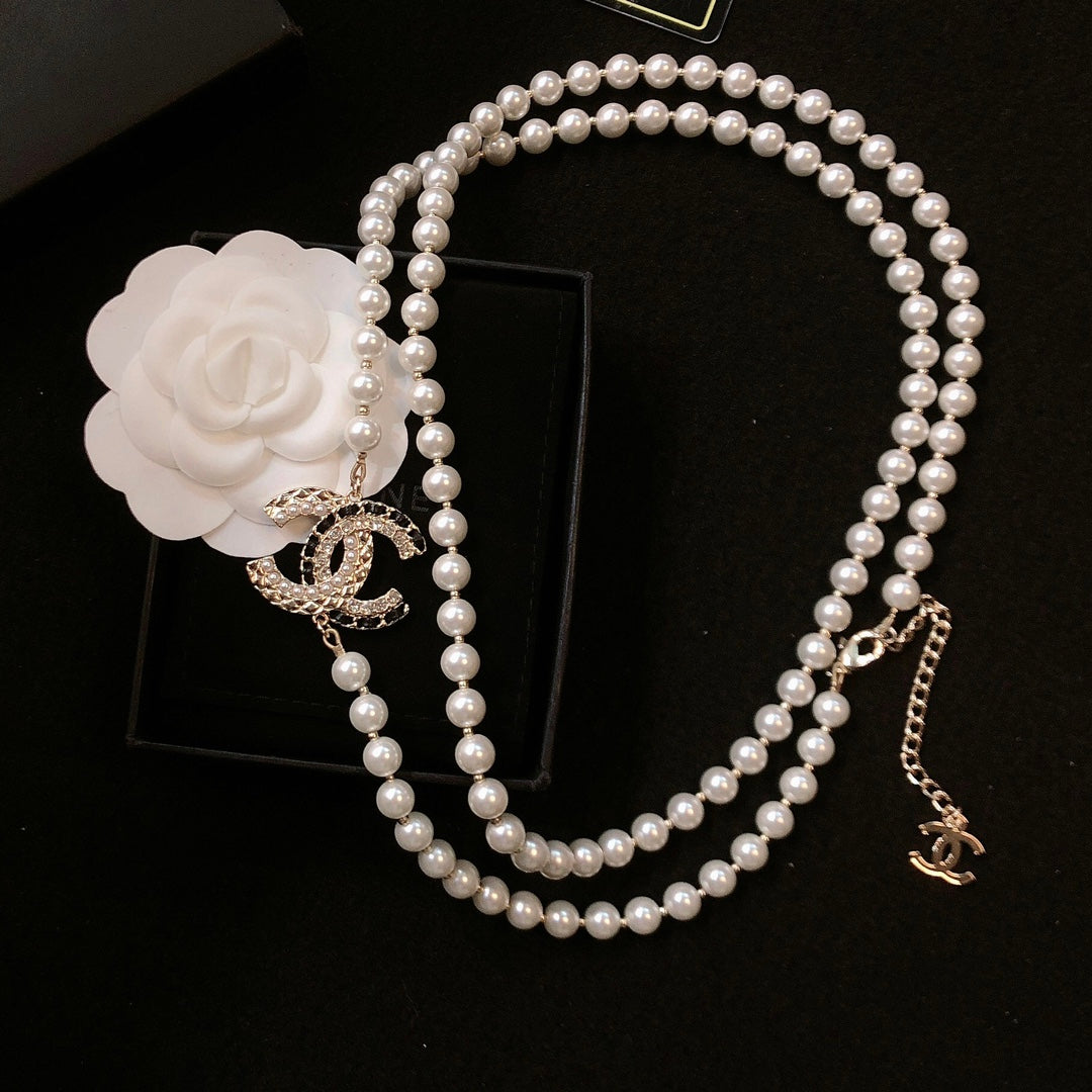 CHANEL 26S DOUBLE C LOGO PEARL LAYERED NECKLACE WITH CRYSTAL CC DETAIL IN GOLD METAL 631831