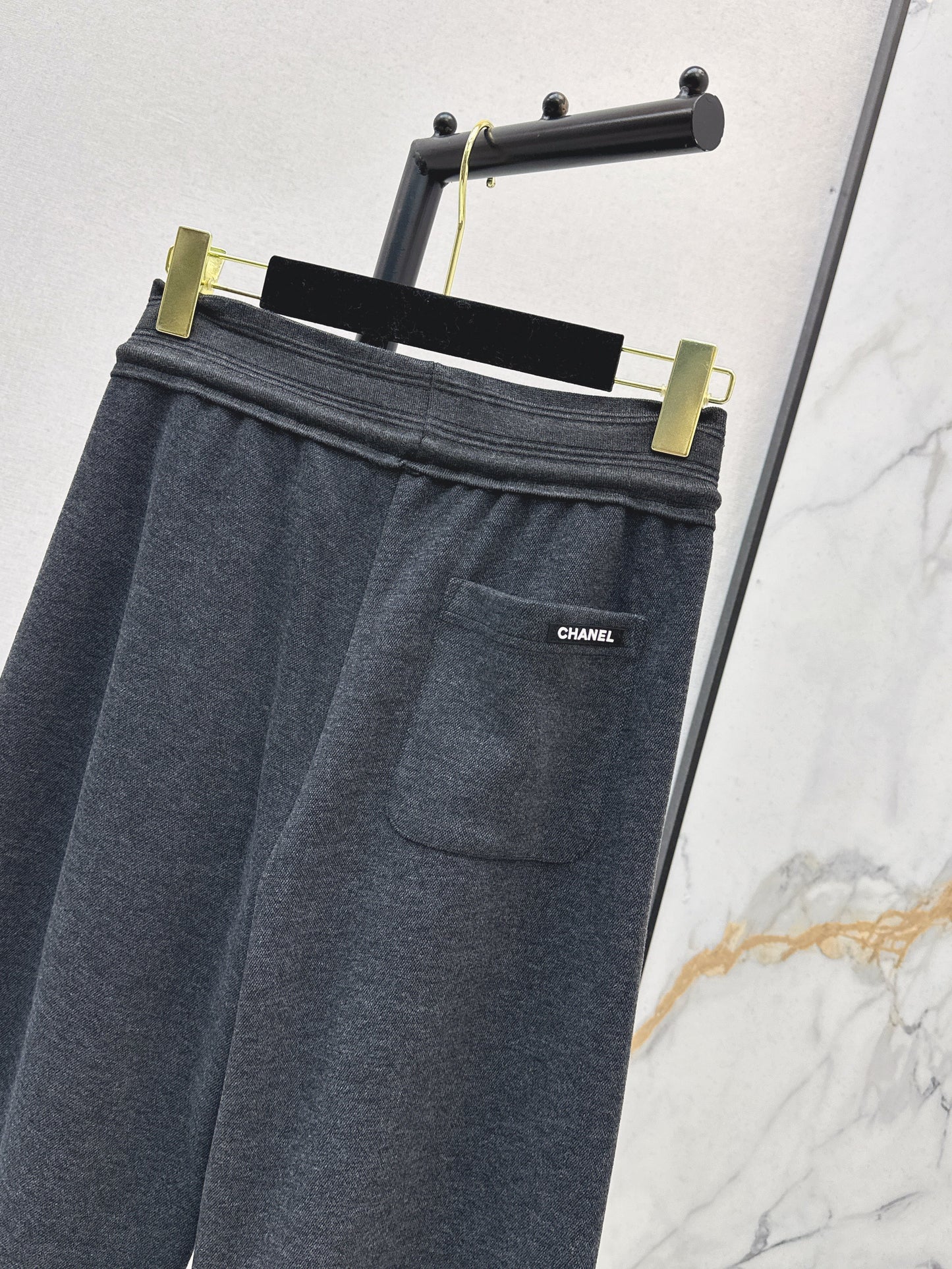 New straight-leg pants with small logo decoration