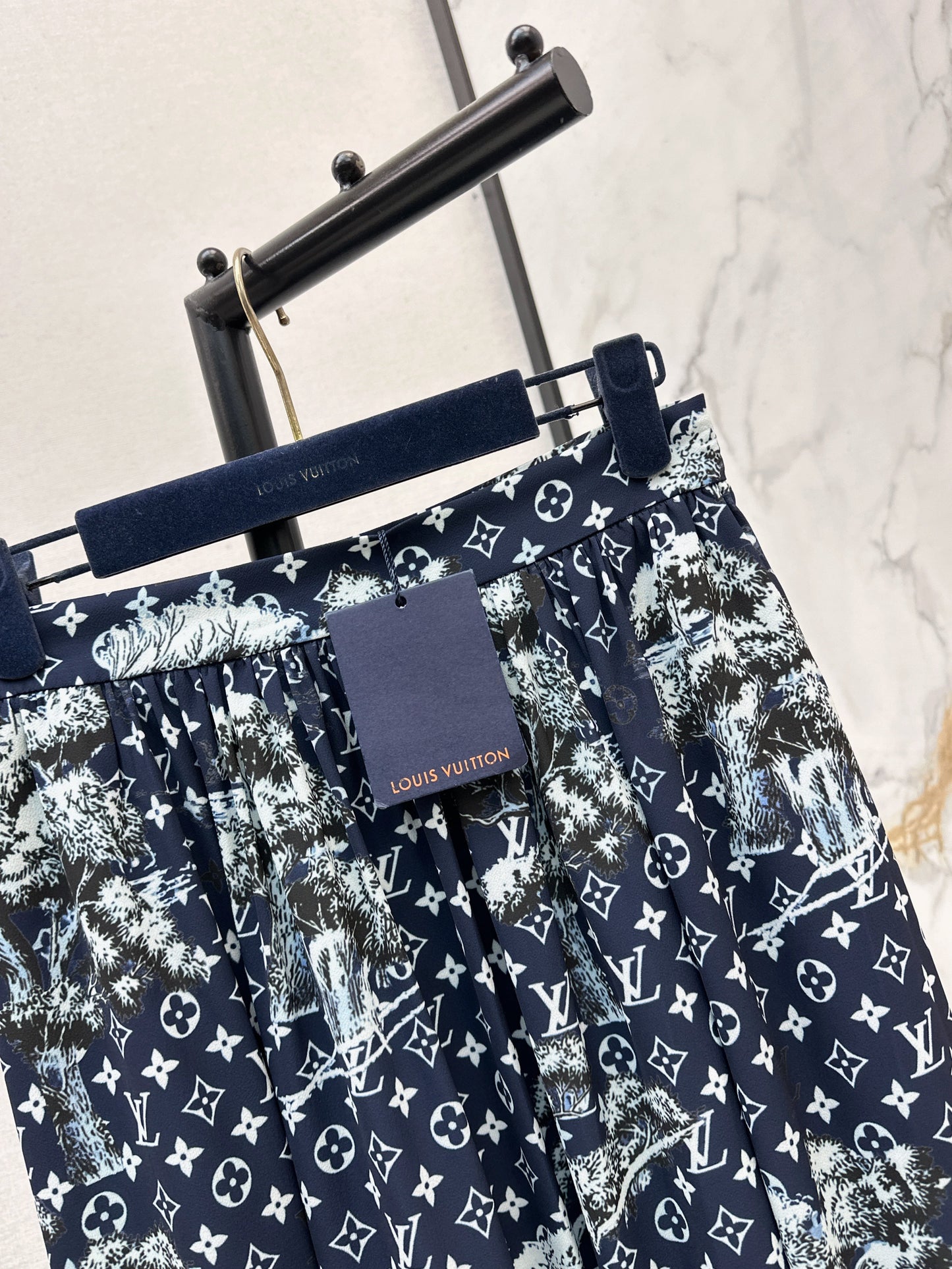 All-over monogram print midi skirt